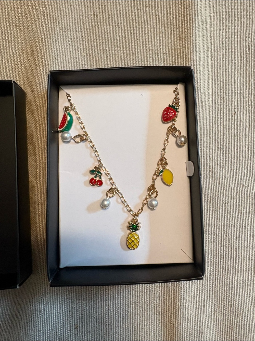 Avon Gold-Tone Fruit Charm Bracelet with Red, Yellow and Green Accents